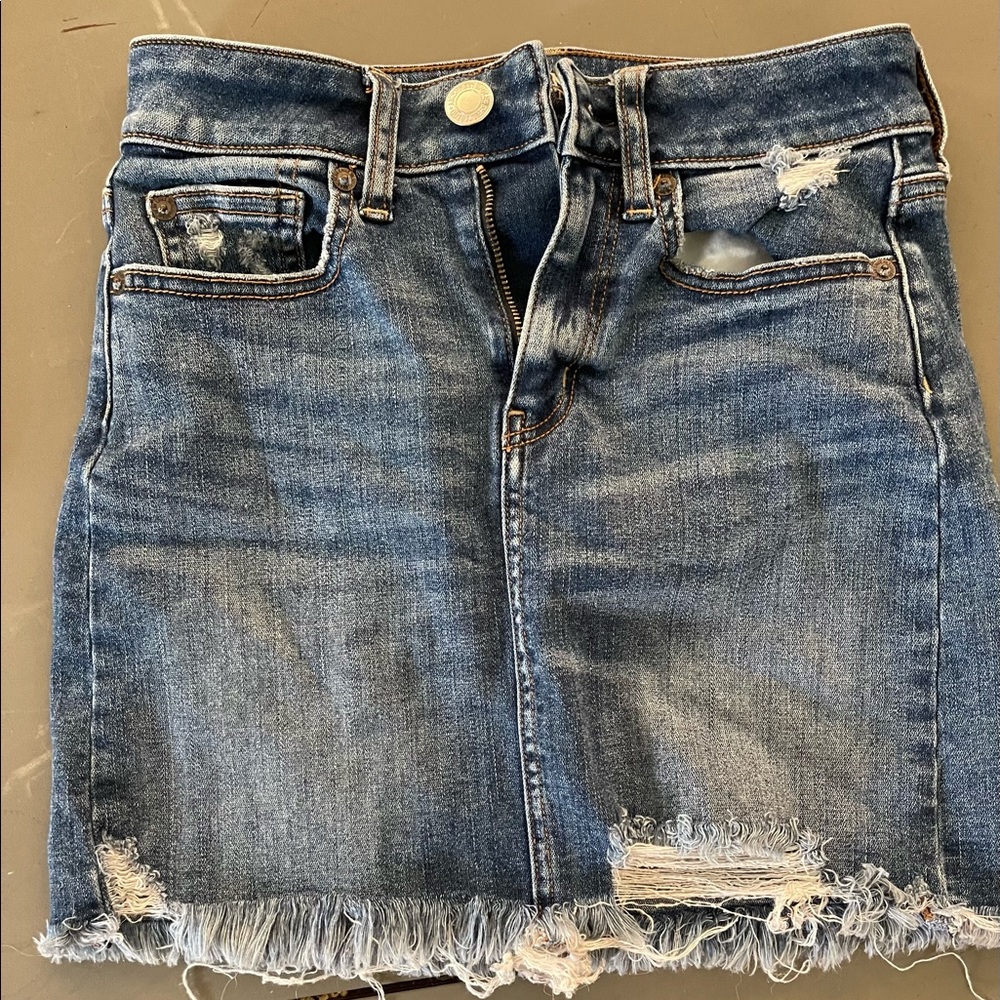 American Eagle denim skirt with fray hem, size 00